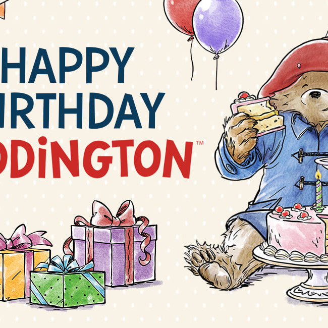 Happy Birthday Paddington banner with presents cake and balloons