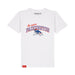 A white short-sleeve crewneck t-shirt featuring a 'Be more PADDINGTON' graphic on the chest with a blue and red Paddington bear on a deckchair illustration. The brand name 'PADDINGTON' is printed inside the collar, and a small red tag is visible near the bottom left hem.