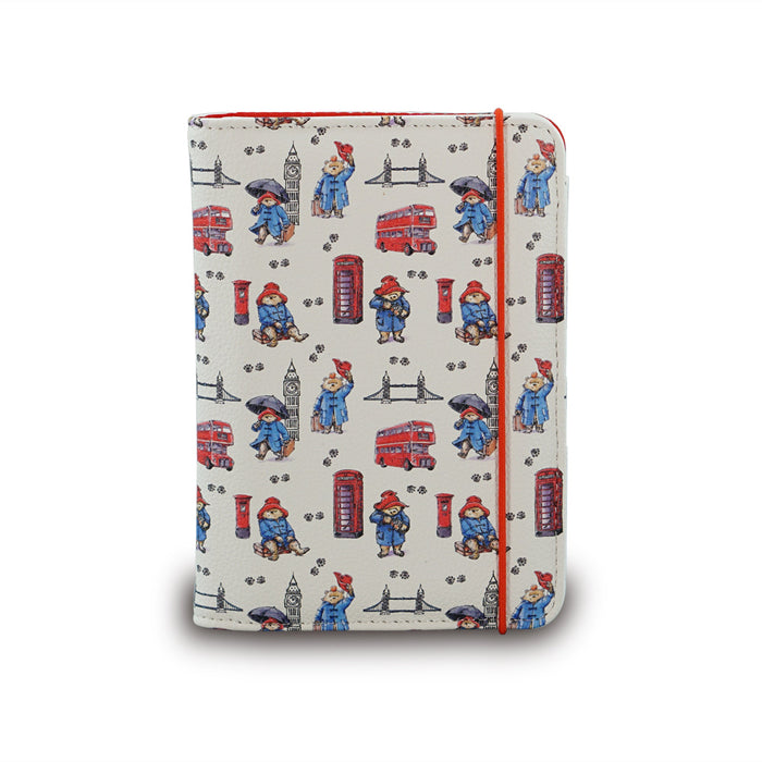 Passport Holder with Paddington Bear and London-themed illustrations on a white background
