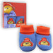 Baby booties with red cuffs and Paddington Bear design, next to packaging box.