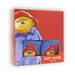 Box of Paddington Bear baby booties with red hat design on a white background