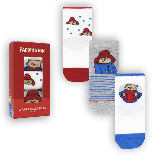 Paddington bear-themed socks and packaging on a white background