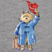 Illustration of a bear in a blue coat and red hat on a gray background