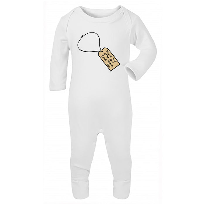 A white long sleeve baby bodysuit with a Paddington Luggage Tag design on the front.