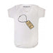 White short sleeve baby bodysuit with a charm design resembling a luggage tag featuring the Paddington Bear figure.