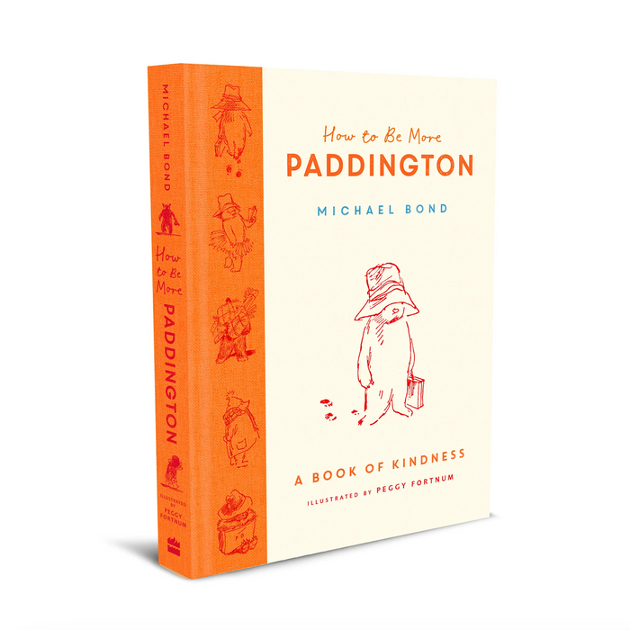 A hardback book called 'How To Be More Paddington - A Book of Kindness by Michel Bond and Peggy Fortnum in orange and cream on a white background