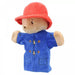 A plush hand puppet of Paddington Bear with a red hat and blue coat.
