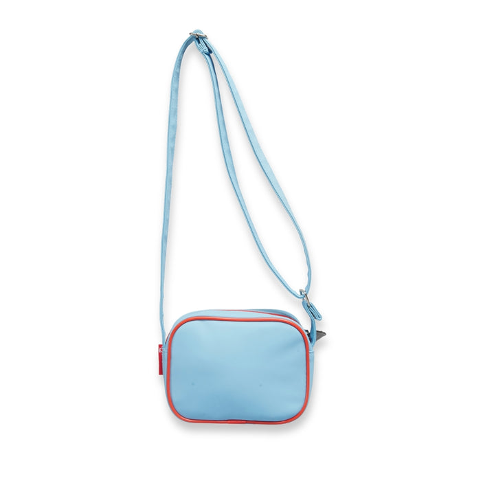 Small blue crossbody bag with a strap on a white background