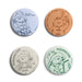 Four round badges featuring illustrations of Paddington Bear with humorous text on a white background.