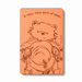 Magnet with bear illustration and text on orange cover