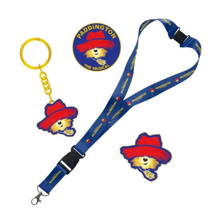 Paddington the musical keepsakes bundle including 2 pin badges a keyring and blue lanyard