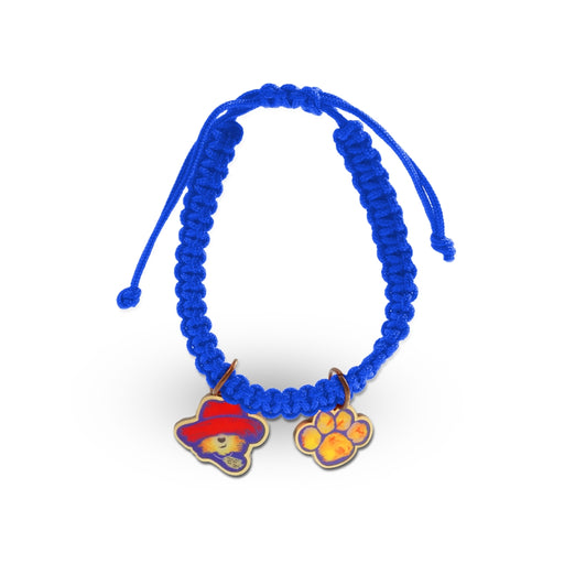 Blue braided bracelet with two colorful charms on a white background