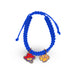 Blue braided bracelet with two colorful charms on a white background