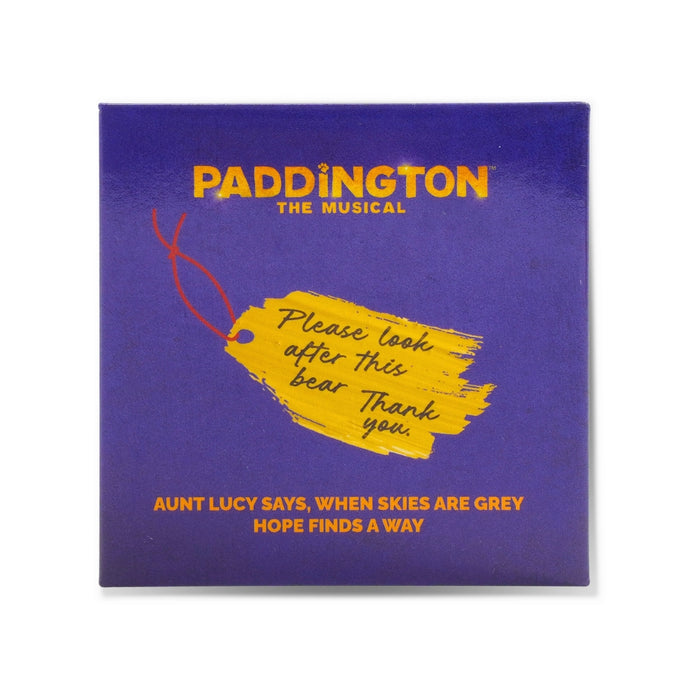 square magnet of 'Paddington: The Musical' with text and a tag illustration on a blue background.