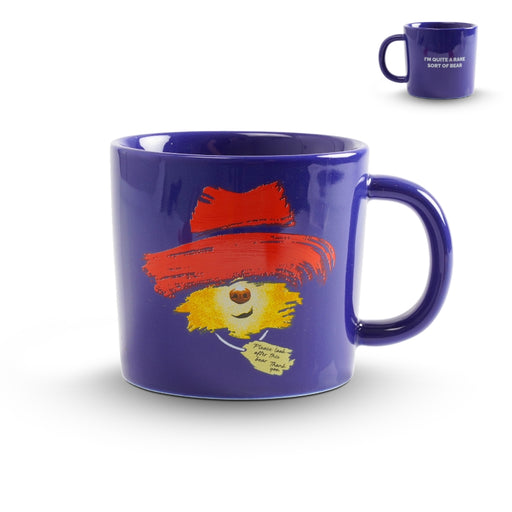 Blue mug with a colorful character design on a white background