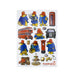 A white sticker sheet featuring a collection of colorful Paddington Bear illustrations, including him in his blue duffel coat and red hat, a red double-decker bus, a black cab, a red telephone booth, a post box, and small British-themed items. The Paddington brand logo is visible in the bottom right corner.