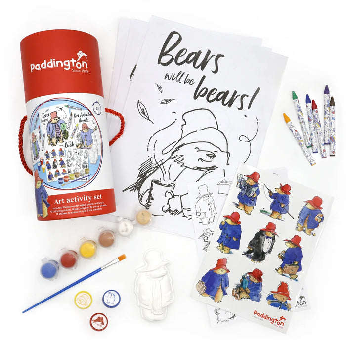 Paddington Bear art activity set with coloring pages, stickers, ink stamps, paints, plaster figurine and crayons on a white background