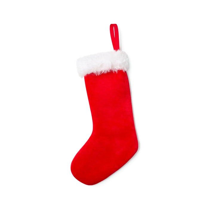 Red Christmas stocking with white fur trim on a white background
