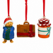 Three Christmas ornaments: Paddington bear, a suitcase, and a jar with a ribbon on a white background.