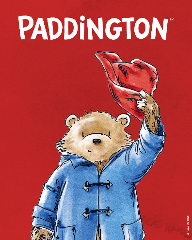 Paddington bear in a blue coat holding a red hat against a red background with 'Paddington' branding.