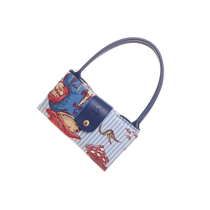 Blue and white striped foldable shopper bag folded with Paddington illustrations