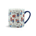 A white ceramic Paddington bear mug with blue handle and London landmarks artwork