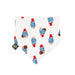A white baby bib bandana with repeating paddington artwork all over