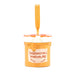 A ceramic hanging Christmas decoration shaped like a jar of marmalade with a 'Paddington's Marmalade' label, complete with a gingham-style lid and a satin ribbon loop.