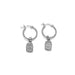 Silver hoop earrings with marmalade jar charms on a white background