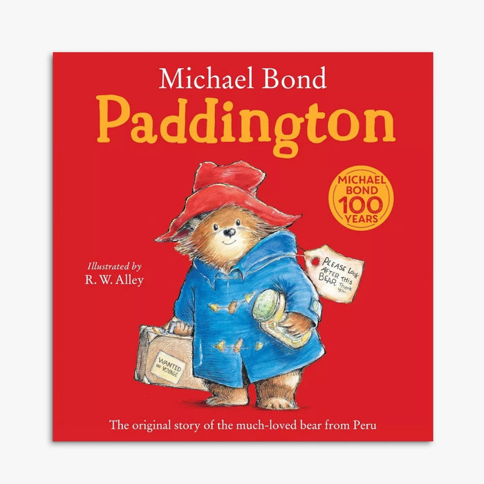 Book cover of 'Paddington' with a bear illustration on a red background