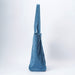 A blue denim canvas tote bag with a double shoulder strap, standing upright against a clean white studio background.