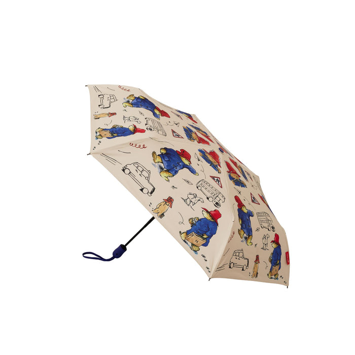 Beige umbrella with Paddington bear cartoon character design on a white background