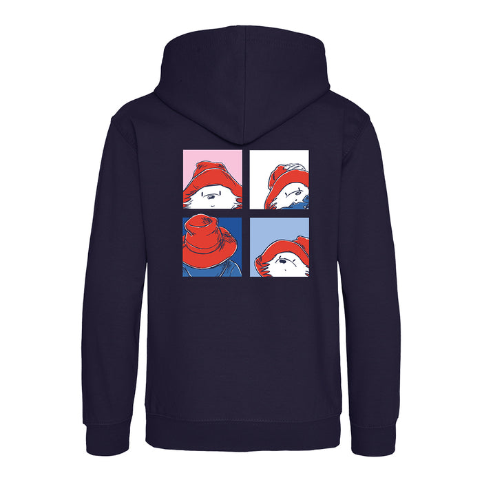 A navy blue hoodie shown from the back, featuring a graphic print of a cartoon Paddington character wearing a red hat in a four-panel comic style.