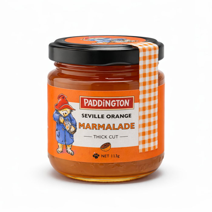 Jar of Paddington Seville Orange Marmalade with a checkered ribbon on a white background