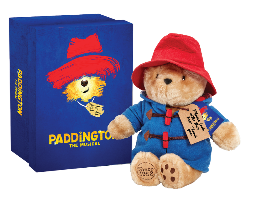 Paddington collectors bear toy with a blue box featuring Paddington's face and 'Paddington The Musical' text.