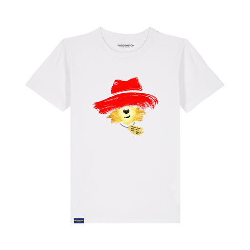 A white short-sleeve crewneck t-shirt featuring a graphic of a paddington bear wearing a red paint-brush hat, with the brand name 'PADDINGTON THE MUSICAL' printed inside the collar.