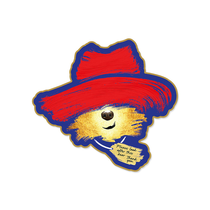 Paddington bear with a red hat on a white background