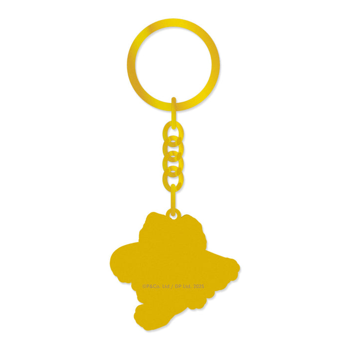 Back shot of brass Paddington The Musical Keyring on a white background