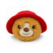 A round Paddington bear plush toy beanie bouncer ball with golden-brown fur wearing a bright red hat, photographed on a clean white background.