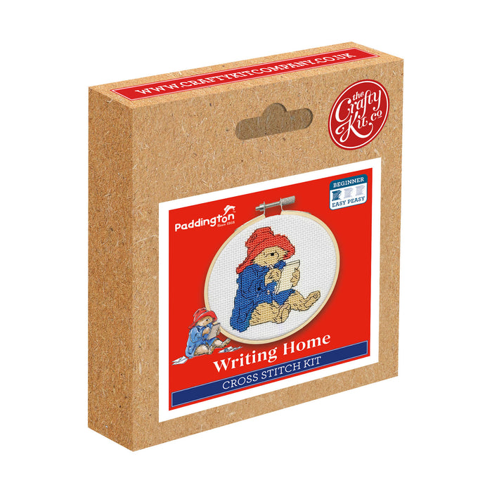 Boxed cross stitch kit featuring Paddington Bear on a white background.