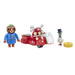 A toy set featuring a small brown Paddington bear figure in a blue coat and green-and-red helmet, a red sidecar-style toy vehicle with white and green details, and a small white pigeon figure wearing a black top hat next to a yellow ring-shaped accessory, all on a plain white background.