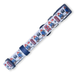 A dog collar featuring a repeating pattern of Paddington Bear and red london buses on a white background, with navy blue trim and a matching navy buckle.