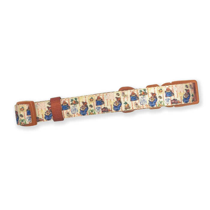 Dog collar with Paddington bear pattern on a white background