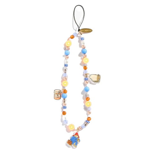 A beaded charm phone strap featuring pastel blue, yellow, and white beads with enamel charms including a beer mug, a coffee cup, and a character carrying a suitcase, on a white background.