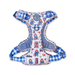 A blue and white checkered dog harness featuring a colorful cartoon pattern of Paddington Bear, red buses, and telephone booths, shown against a plain white background.