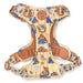 Dog harness with colorful design on a white background