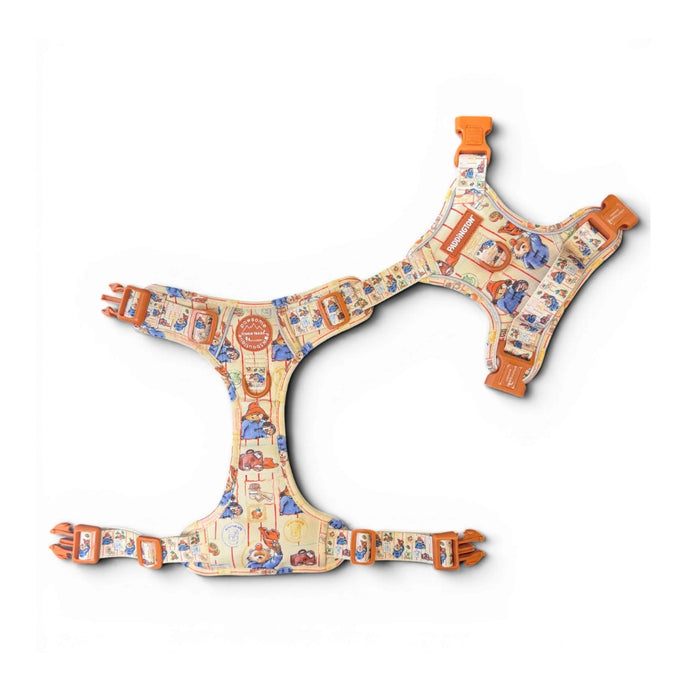 Decorative dog harness with cartoon character pattern on a white background