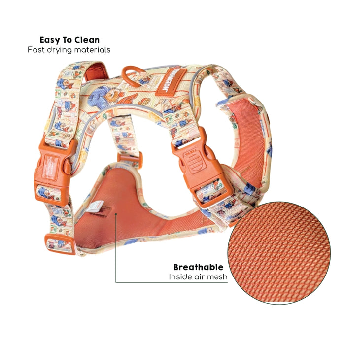 Dog harness with cartoon design and text highlighting features on a white background