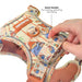 Paddington bear-themed dog harness with a hand holding it, labeled 'Back Handle'.