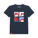 A navy blue short-sleeve t-shirt featuring a graphic of Paddington Bear in a four-panel comic style. The graphic shows Paddington wearing his signature red hat, with the words 'PADDINGTON' printed inside the collar and a small red tag near the bottom left hem.